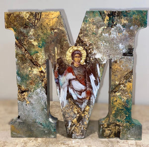 Letter M icon with Archangel Michael